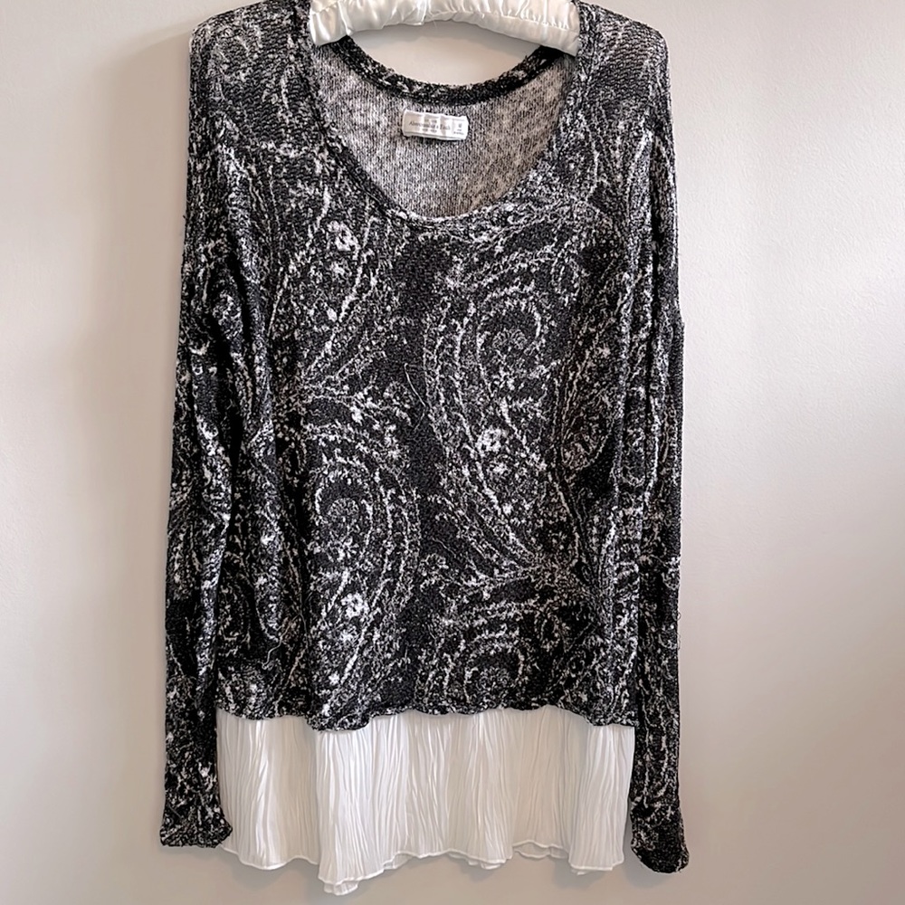 Abercrombie & Fitch sweater with a fringe on the bottom.